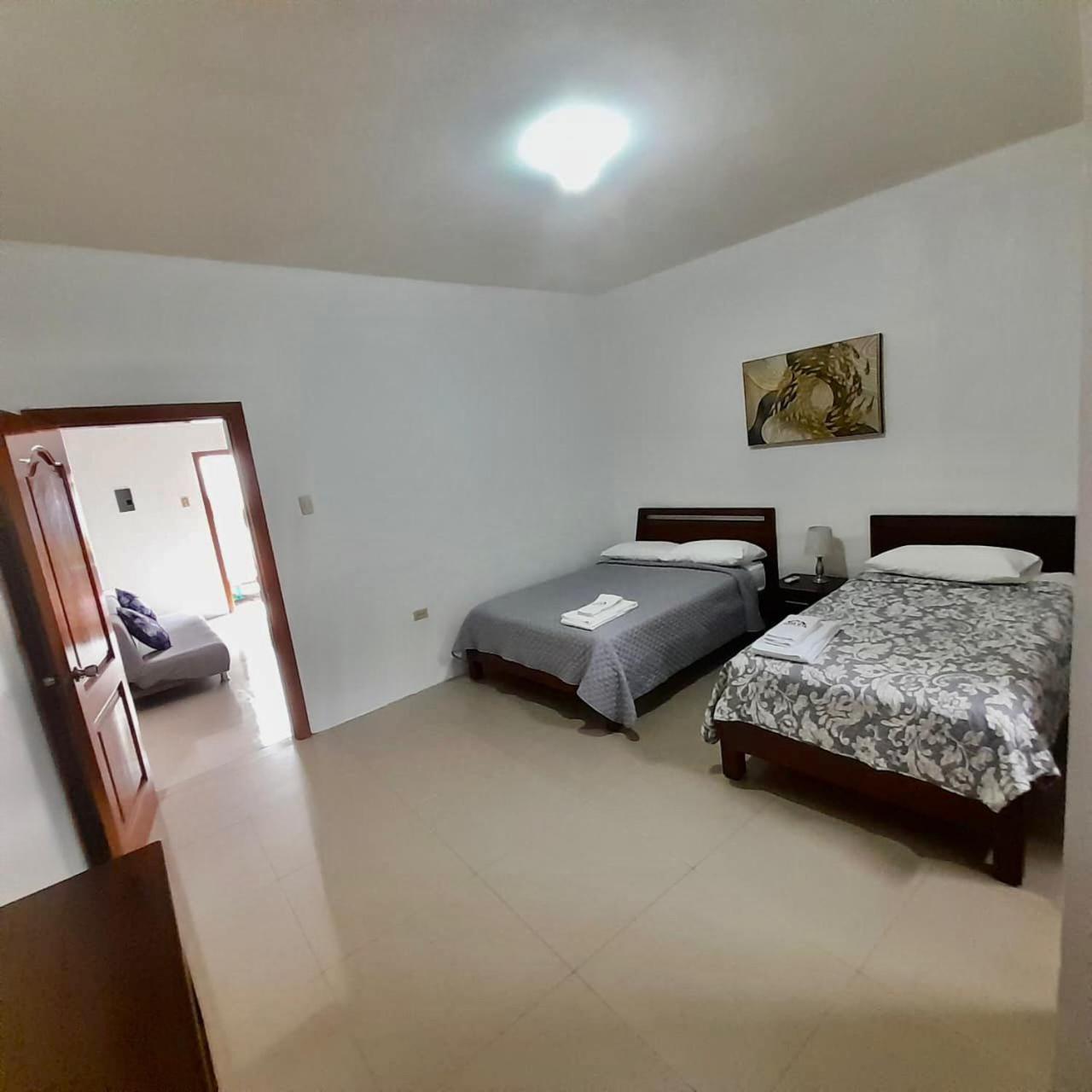 Apartahotel Casa Soleil Puerto Villamil Quarto foto